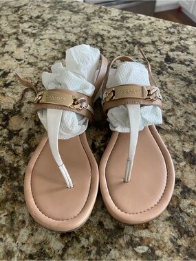 Coach Nude Tan Leather T-Strap Sandals with Gold Chain Detail